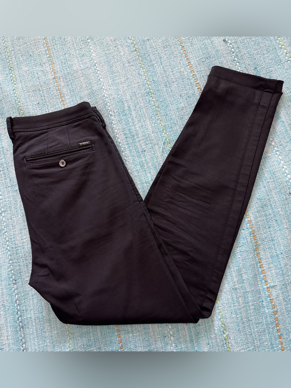 Diesel Black Slim very Stretch Chinos . 
Minor loose stitches at ankle opening.